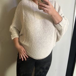 Beige sweater with open back